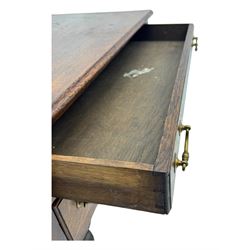 George II oak lowboy, moulded rectangular top over one long and two short drawers fitted with brass drop handles, shaped apron with scrollwork carvings, raised on cabriole supports