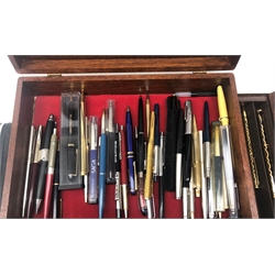  Forteen Parker pens including Fountain and Ballpoint, a Telescopic octagonal chrome pen, Paper Mate ballpoint pens, Celtic Lands fountain and ballpoint set in wooden case and others in mahogany case  