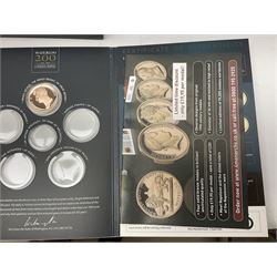 Great British and World coins and banknotes, including pre-decimal coinage, Britain's first decimal coins sets in blue folders, silver one yen coin converted into a brooch, commemorative crowns etc