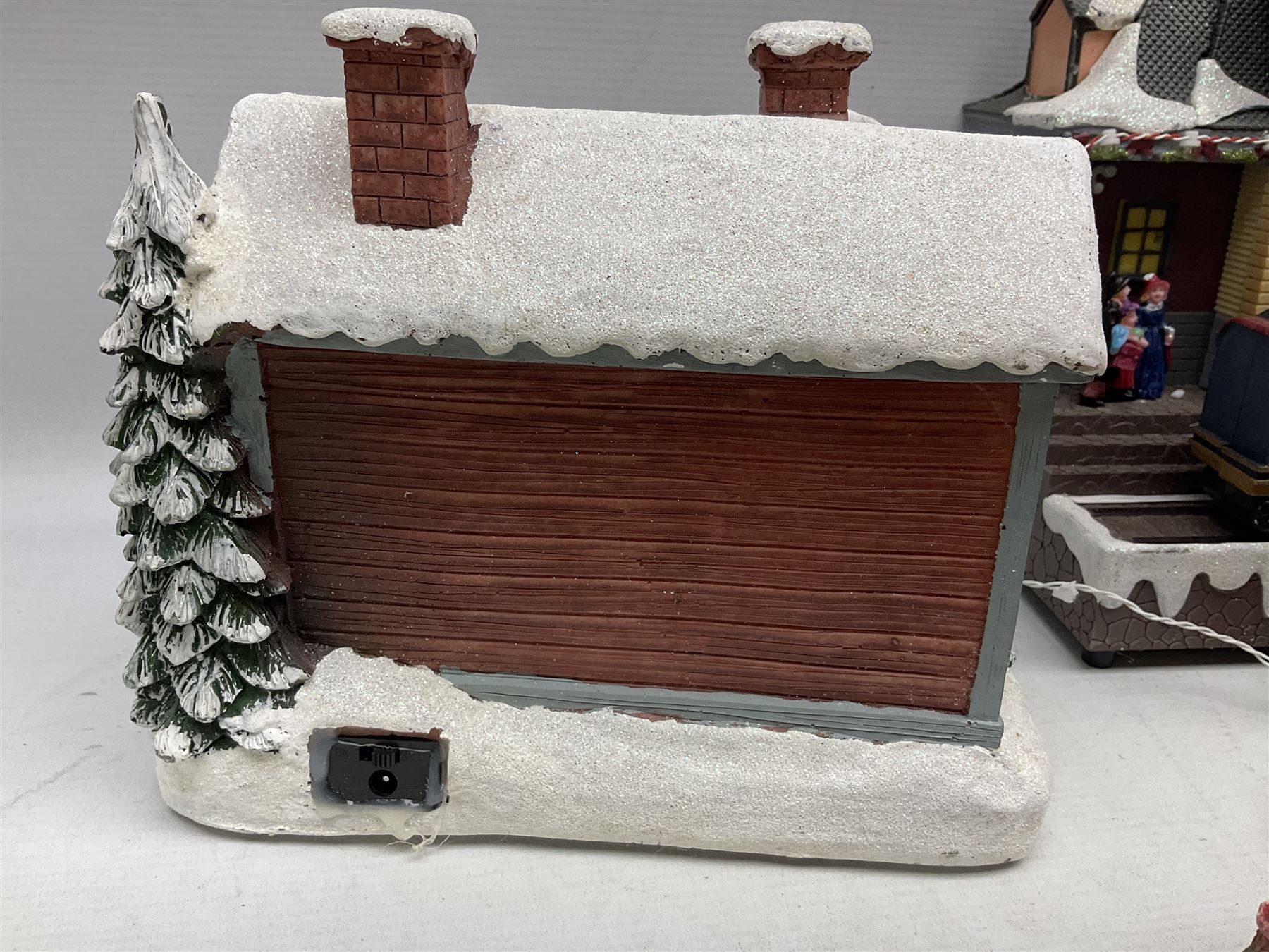 Christmas decorations; Premier LED Christmas Village scene with moving train, together with three Lumineo christmas scenes, and other similar 