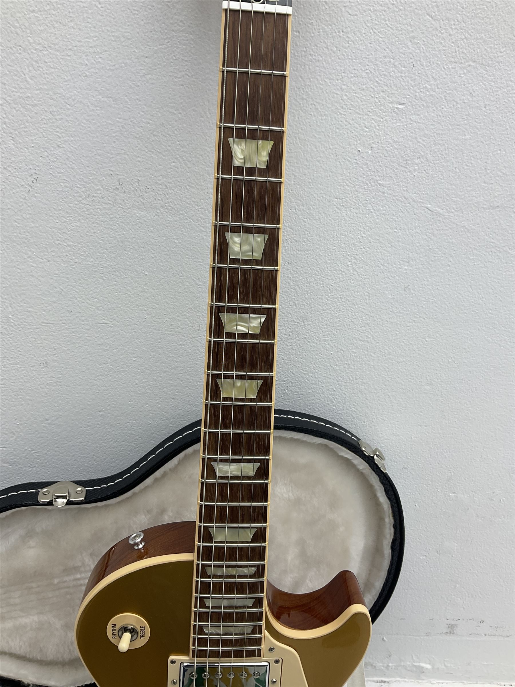 2011 Gibson Les Paul Traditional gold top electric guitar; serial number 103110461; with  mahogany back, twenty-two frets, 57 Classic humbuckers and bridge/stop bar tailpiece L100cm; in Gibson hardcase with owners manual and associated paperwork