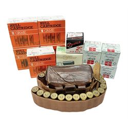 SHOTGUN CERTIFICATE REQUIRED - AMMUNITION - one-hundred and seventy-six 12-bore shotgun cartridges, boxed and in a leather cartridge belt with pouch; together with ninety-five .410 cartridges (seventy-nine 65mm and sixteen 50mm) in boxes