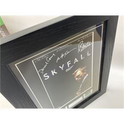 Limited edition framed James Bond 007 Skyfall print, 126/600, boxed Spectre pen, Aston Martin DB5 keyring and sealed 007 50th Anniversary Edition boxed monopoly game (4)