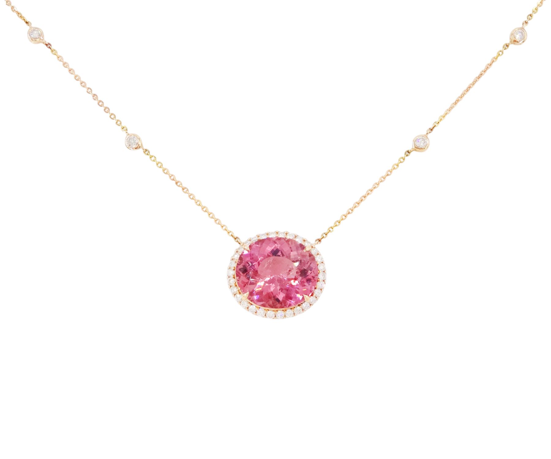 18ct rose gold pink tourmaline and diamond pendant necklace, oval cut tourmaline of 15.41 carat, surrounded by round brilliant cut diamonds, to a trace link chain necklace set with four diamonds, stamped 750, total diamond weight 1.22 carat, with World Gemological Institute report