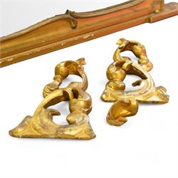 Large Victorian gilt wood overmantle mirror, shaped cresting rail with curled acanthus leaf pediment, the corners decorated with foliate C-scrolls and flower heads, curled foliage lower corner brackets, plain mirror plate 