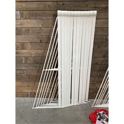 Commercial wall hanging rug display rack