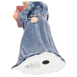 Four Royal Doulton figures, comprising The Mark Seller HN2103, The Wizard HN2877, The Blacksmith Arms HN2782, Morning Ma'am HN2895 