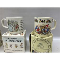 Royal Doulton Bunnykins nursery set in box and two cups, together with two Wedgwood Peter Rabbit mugs and Royal Staffordshire Noddy money box and cup (7)