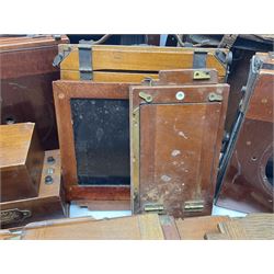Collation of folding plate cameras of various sizes folding plate in mahogany and lacquered brass, together with camera plates and slides
By vendors repute some slide are from the Gandolfi workshop