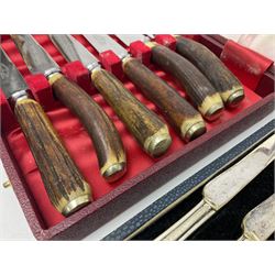 Set of six stag horn handled knives by Cooper Brothers and Sons, together with a set of silver plated dessert knives and forks for six place settings, both within fitted cases