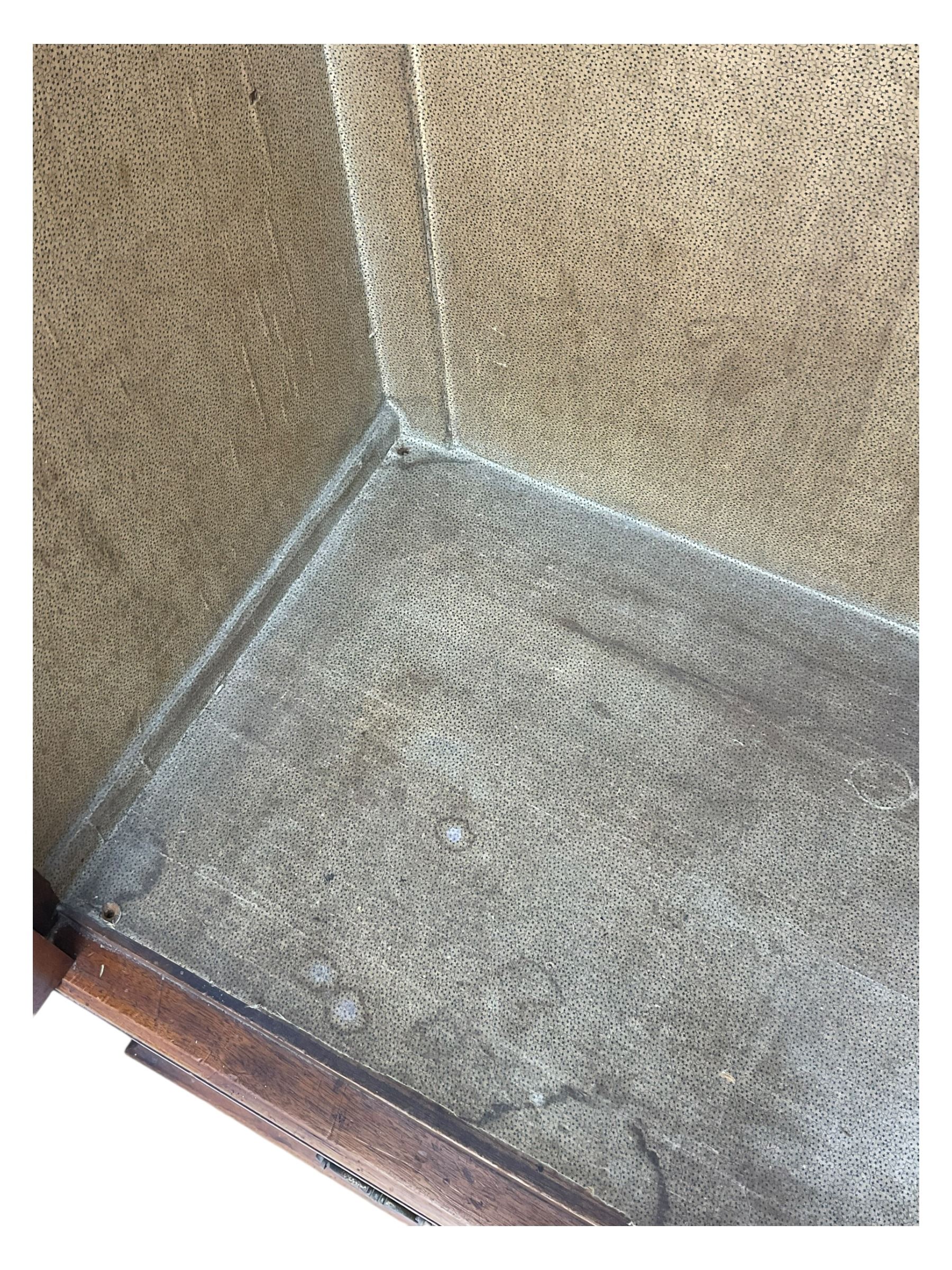 Late Victorian walnut triple combination wardrobe, projecting moulded and dentil cornice, central shaped bevelled mirror glazed door, cartouche and curled leaf carved panels over figured walnut veneered panels, fitted with drawer to base, on bracket feet