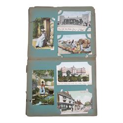 Collection of early 20th century postcards and greetings cards, including WWI embroidered silk Christmas card, black and white family photographs, 1920s birthday cards, black and white and colour postcards of Margate, Ramsgate, Blackpool etc, housed in three postcard albums