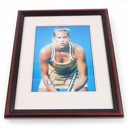 Collection of sporting related prints, some signed, some with printed signatures, including Pele and Michael Schumacher