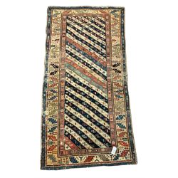 Early 20th century Turkish rug, diagonal striped field decorated with geometric motifs, repeating border