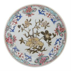 Amsterdam bont teapot, decorated with a basket of flowers, together with two Amsterdam bont saucers of similar design and five other saucers  