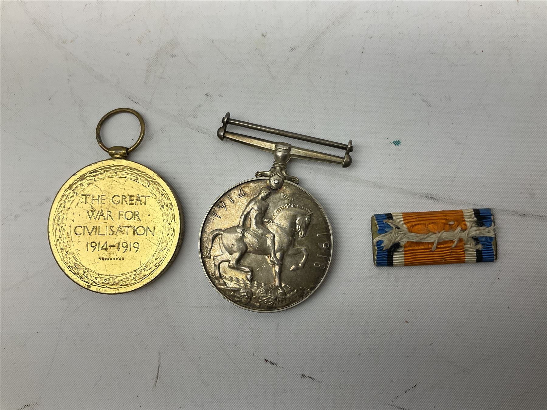 Mostly Great British coins including Queen Victoria 1887 and 1888 crowns, pre-decimal coinage, various five pound coins etc and a WWI War and Victory medal pair named to '16903 PTE. H. SCHOFIELD. 2-CO. OF LOND. Y.'