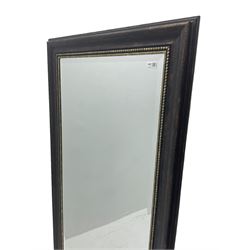 Bevelled wall mirror in bronze finish frame 