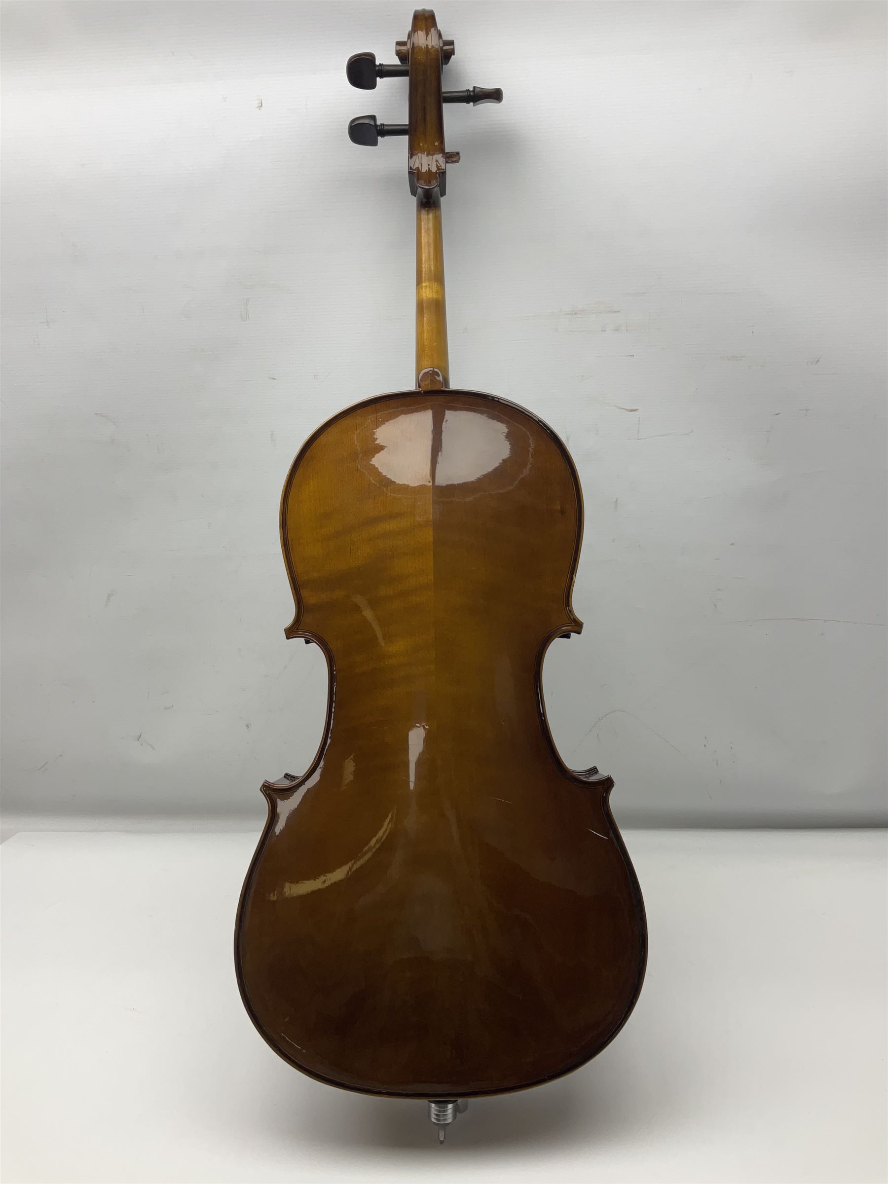 Stentor Student I quarter-size cello with 59.5cm two-piece maple back and ribs and spruce top; bears maker's label with serial no.M072648 L95.5cm overall; in Stentor soft carrying case with bow