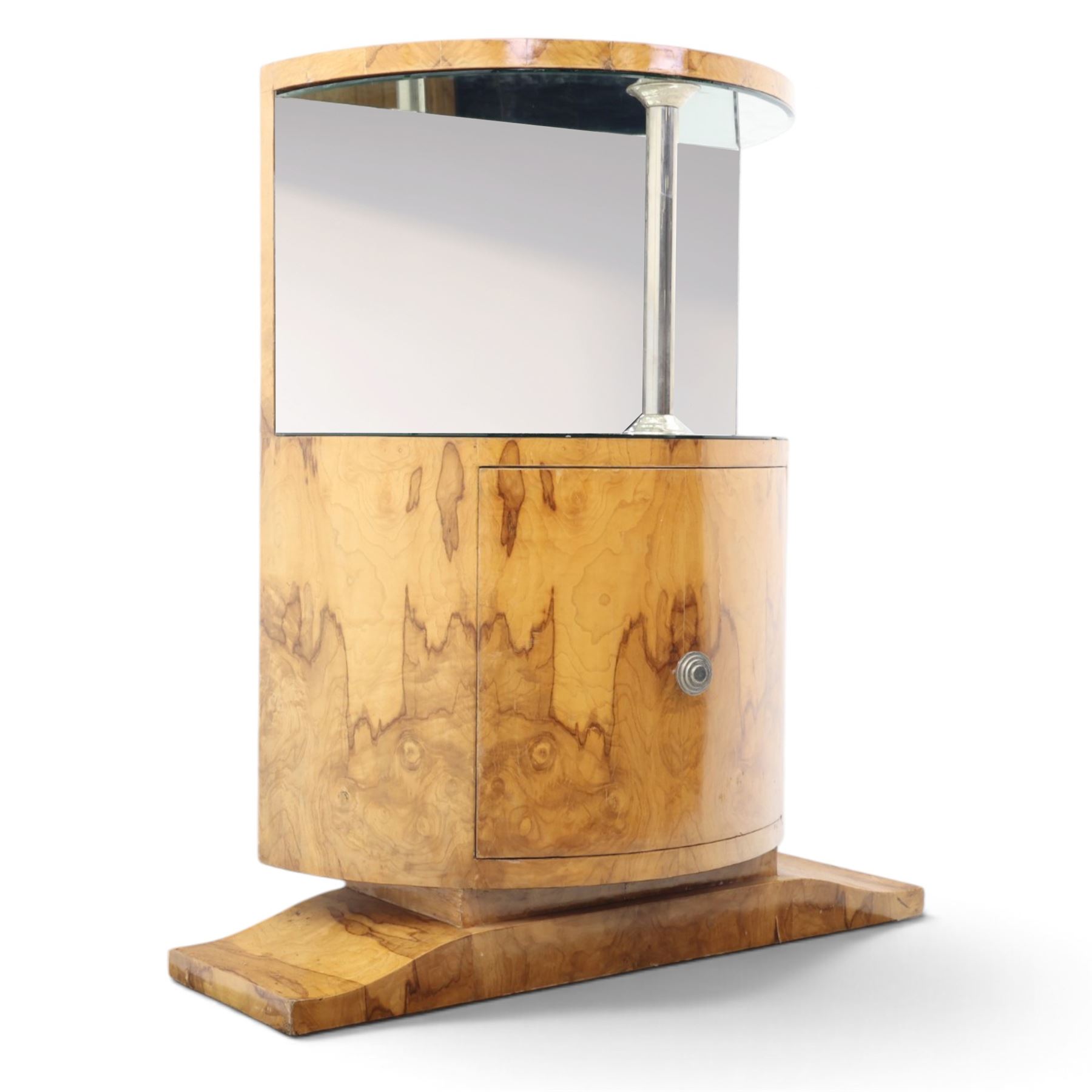 Art Deco figured walnut cocktail cabinet, demi-lune top above mirrored open compartment supported by chrome column, enclosed cupboard below with curved door, on shaped plinth base