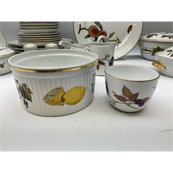 Royal Worcester ‘Evesham’ pattern tea and dinnerwares, to include lidded tureens, pie dishes, dinner plates etc in two boxes