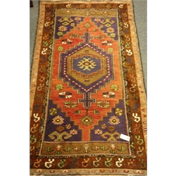 Persian Hamadan red and blue ground rug, lozenge with pole medallion, stylised motifs, 183cm x 104cm  