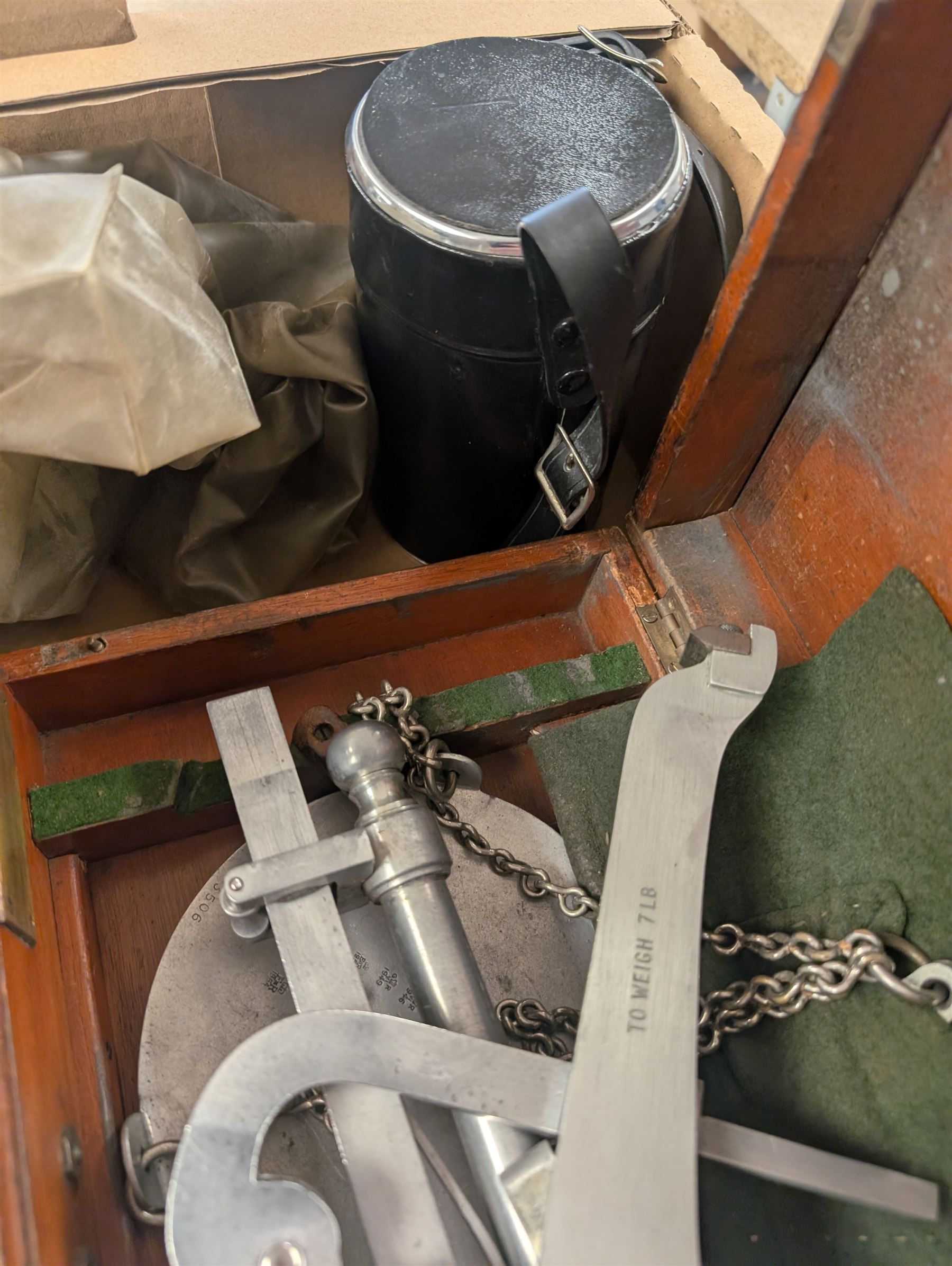 Sigma Multi Telemax 1:2.8 f=135mm lens, a set of DE Grave 7lb scales with County Borough of Blackpool scales in mahogany box and a Vickers Instruments microscope