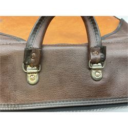 Large leather bag in orange and brown colourway, with zip closure and twin handles, H64cm