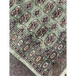 Persian Tekke Bokhara green ground runner rug 