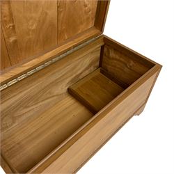 Mid-to-late 20th century Singapore camphor wood blanket chest, the hinged lid and front decorated with flower head carved bands