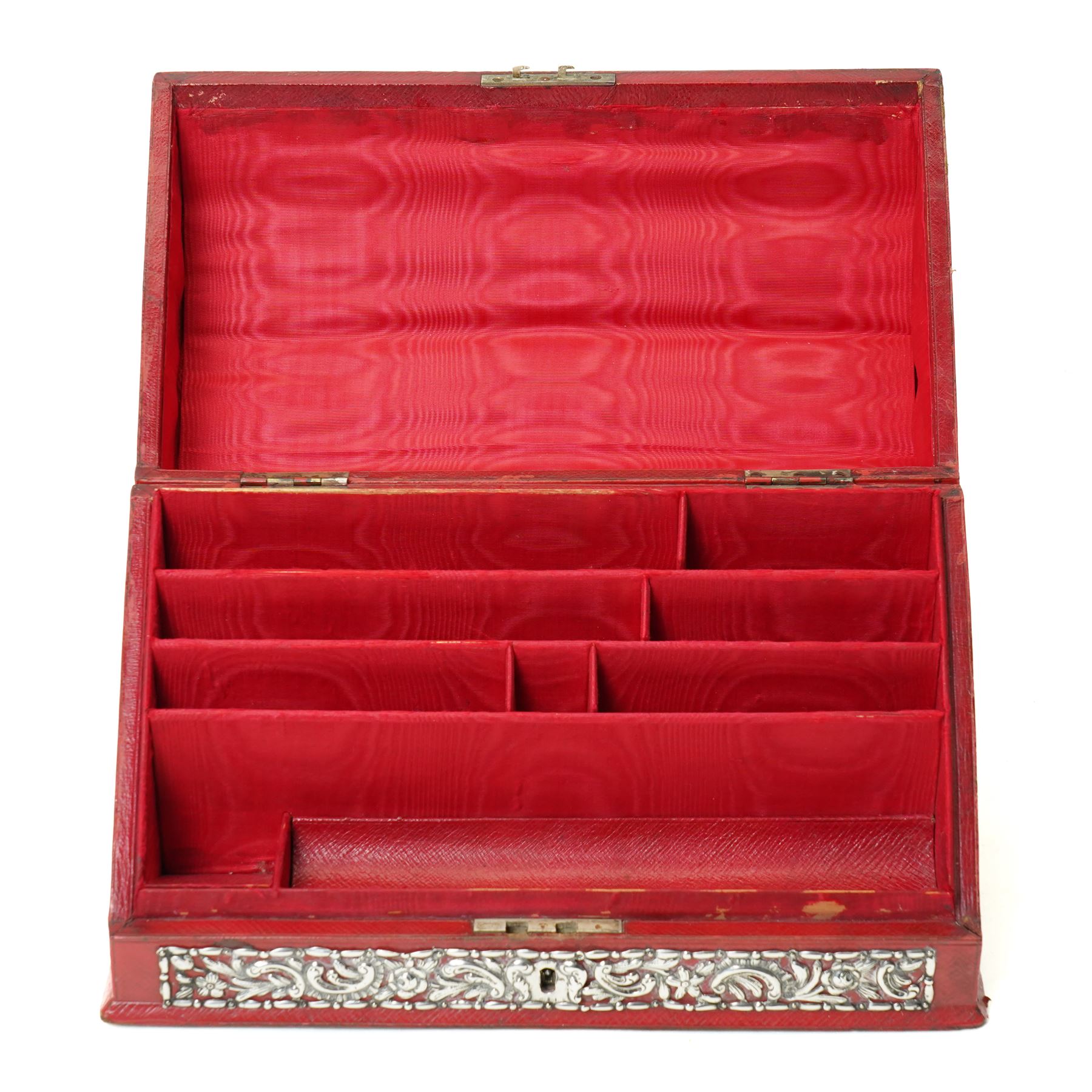 Late Victorian red leather stationery casket with divided watered silk interior, the hinged front with repousse silver mounts H19cm x W30cm London 1889 Maker William Comyns