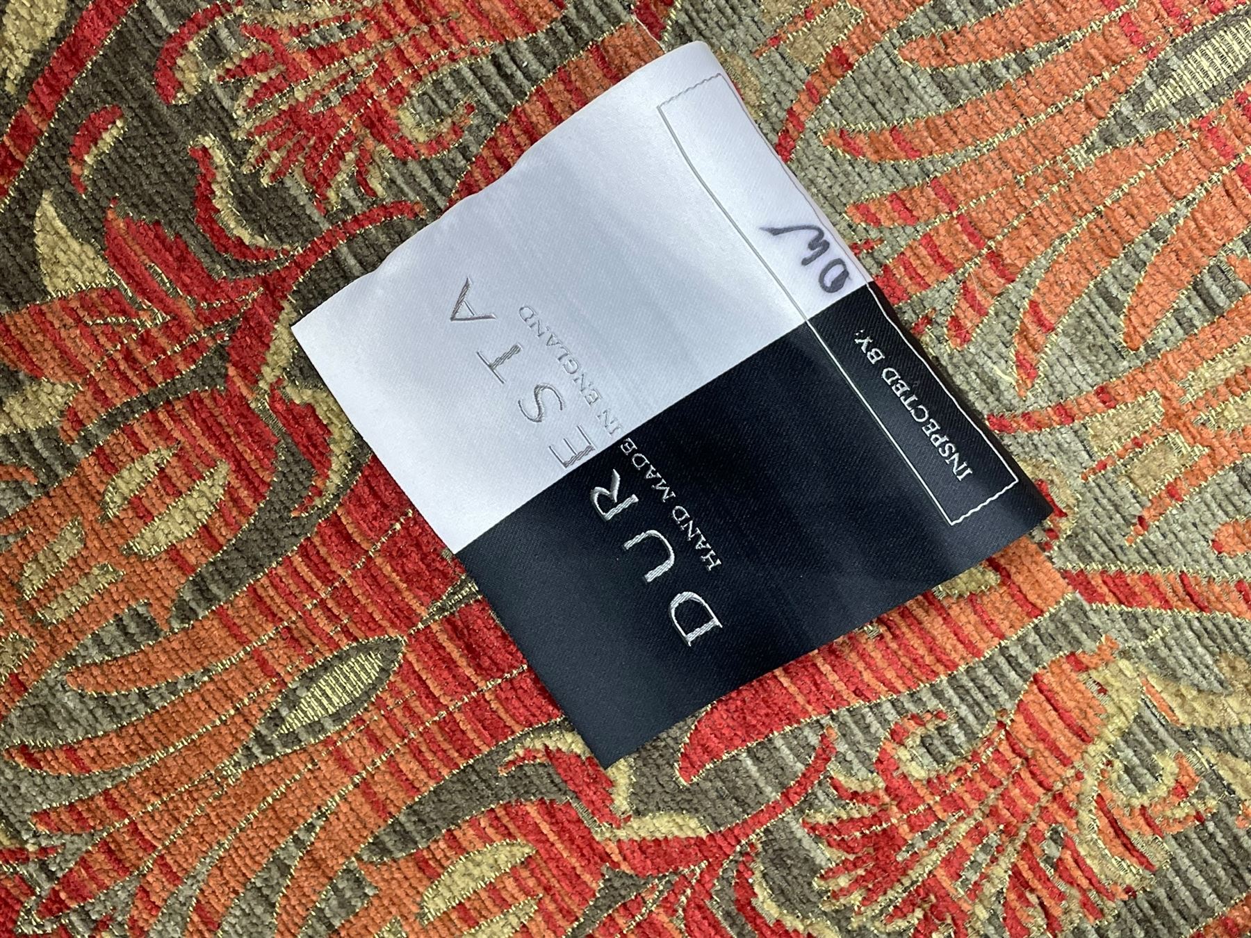 Duresta - 'Beaminster' grande two-seat sofa, traditional shape with rolled arms, upholstered in 'Althorp' russet and stone floral pattern fabric, on turned feet with brass castors
