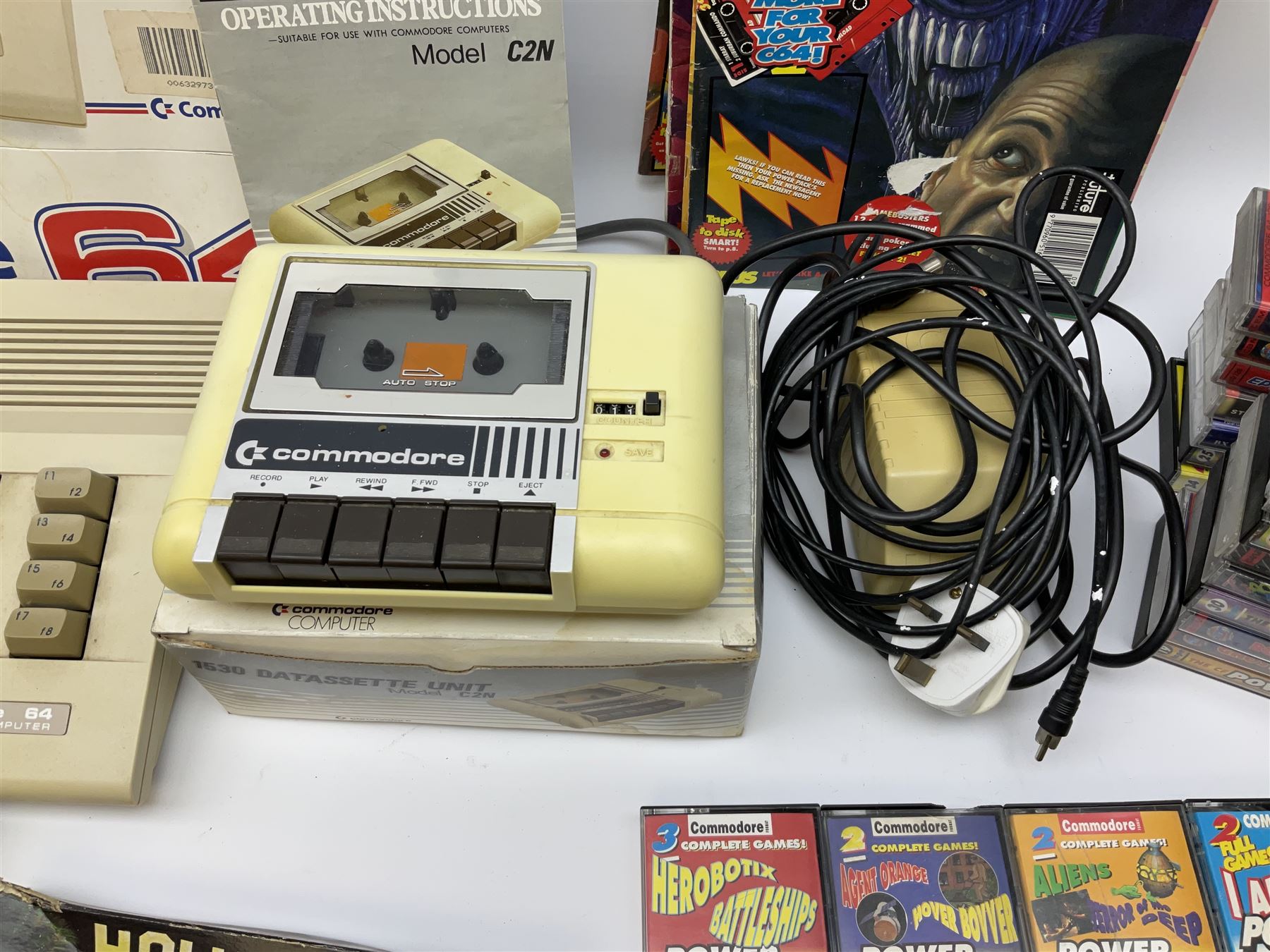 Commodore 64 games computer with boxed 1530 Datassette Unit Model C2N, two joysticks, over seventy games and twenty-two Commodore magazines; polystyrene box inner and card slip-case