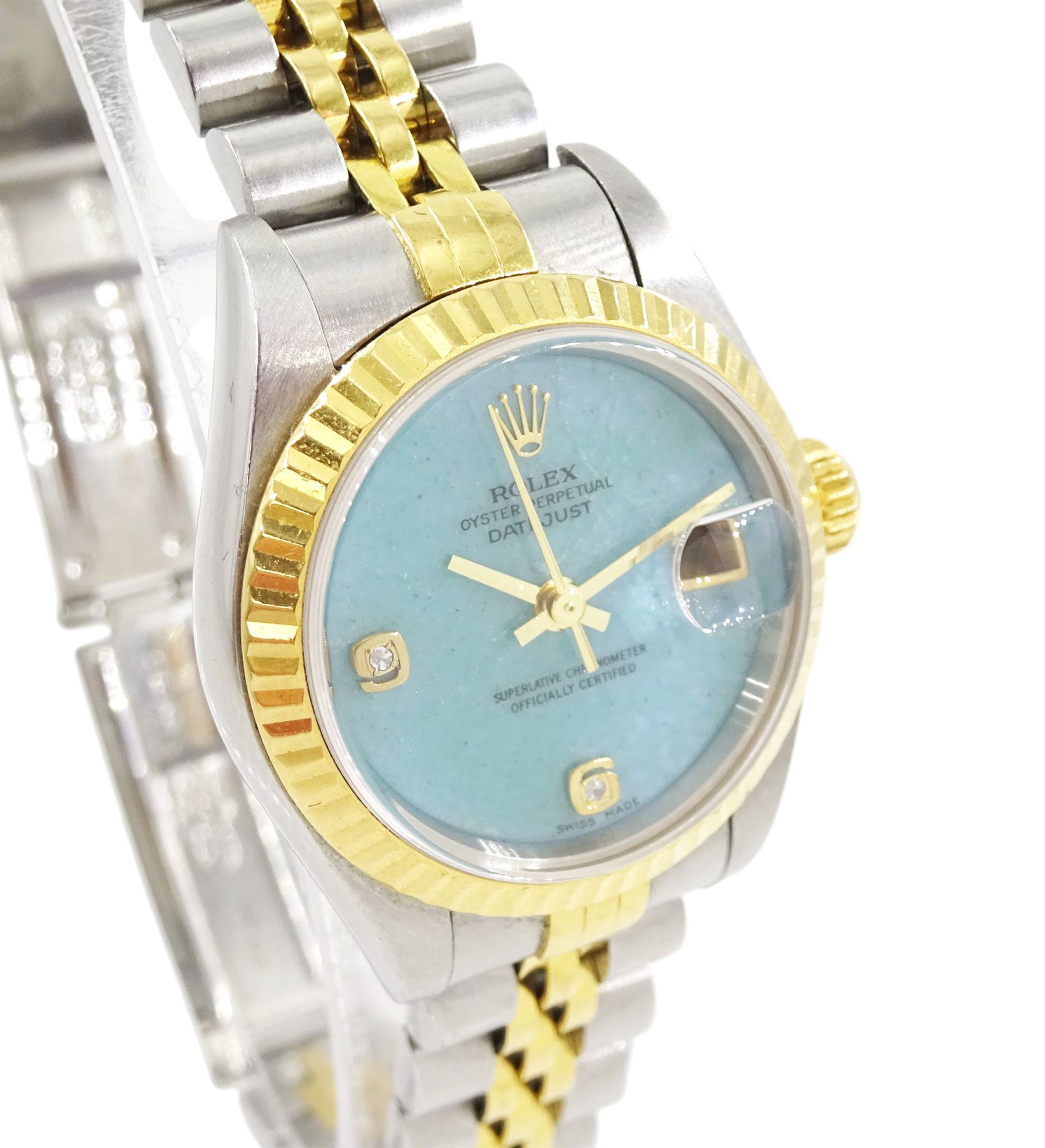 Rolex Oyster Perpetual DateJust ladies stainless steel and gold automatic wristwatch, circa 1999, Ref. 79173, serial No. A854711, blue jadeite dial with diamond dot hour markers at 6 and 9 o'clock, on Rolex Jubilee stainless steel and gold bracelet, with fold-over clasp, boxed with papers and additional links
