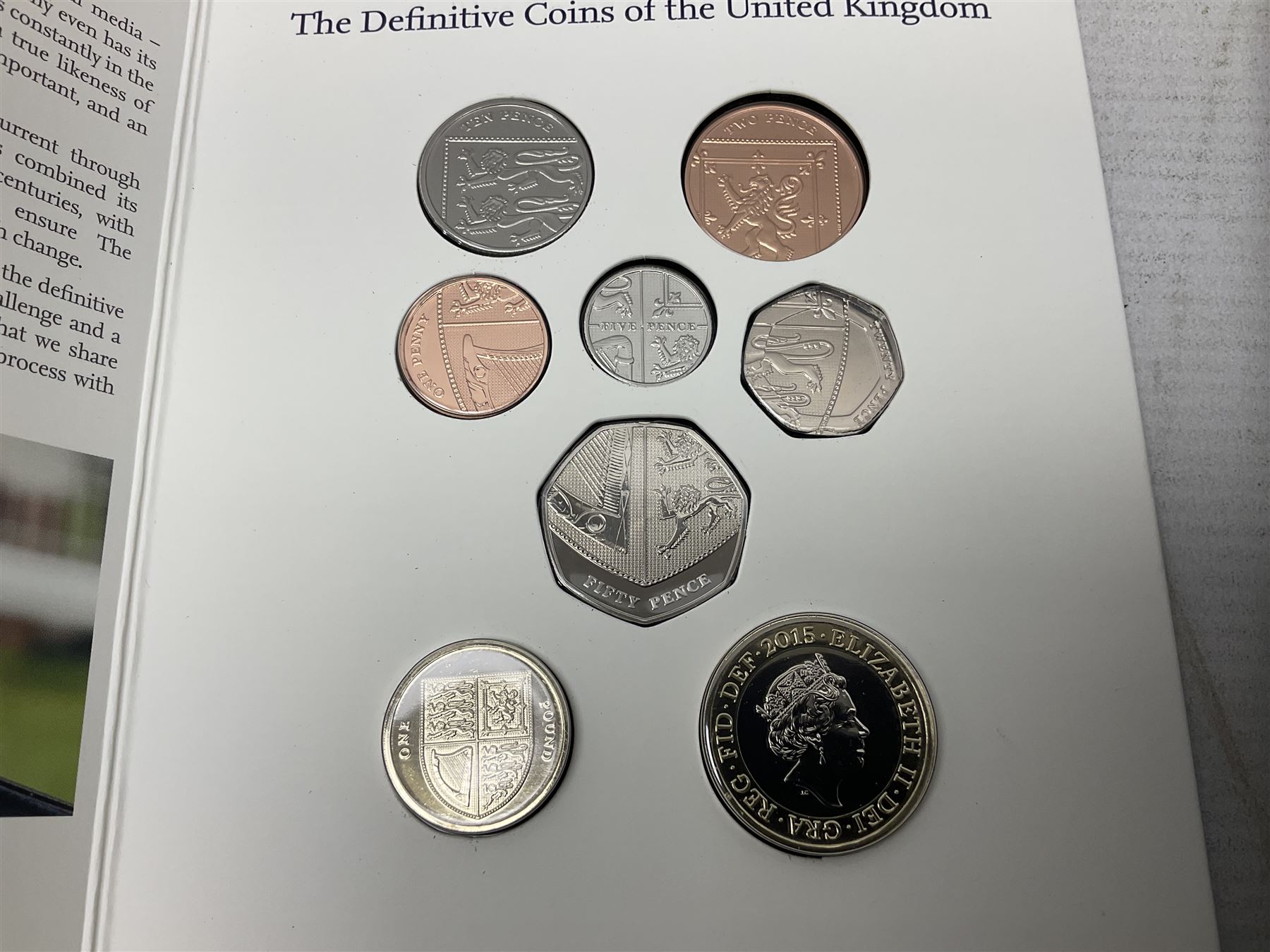 The Royal Mint United Kingdom 2005 proof coin set, with certificate, 2009 'Henry VIII' brilliant uncirculated fine pound coin, 2010 brilliant uncirculated coin collection, 2015 'The Fourth and Fifth Circulating Coinage Portrait Collection', and 'Farewell and Nations of the Crown UK' one pound brilliant uncirculated two coin set, all cased or in card folders
