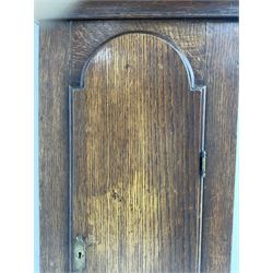 John Fletcher of Barnsley - Mid18th century 30-hour oak cased longcase clock, with a flat pediment and broad cornice, square hood door with attached pillars and gesso capitals, long trunk and conforming door with a break arch top, square plinth on a shaped base, brass dial with cast spandrels and engraved dial centre, chapter ring with Roman numerals and five minute Arabic’s, engraved calendar dial and steel hands, chain driven count wheel movement striking the hours on a bell. With pendulum and weight. The Fletcher family were a prolific family of clockmakers working in Barnsley (Yorks) during the 18th and early 19th century.