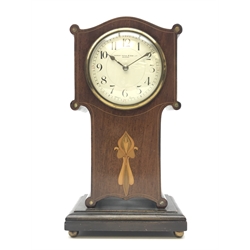 Art Nouveau inlaid mahogany serpentine top mantel timepiece, the  convex white enamel Arabic dial signed 'Manoah Rhodes & Sons. Ltd. Bradford', with brass bezel and key wind movement, on plinth base with brass ball feet, H26cm