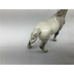Seven Beswick figures of horses, including Connemara pony in grey no.1641, Arab in bay no.1265, large foal in grey no.947 etc, together with a Goebel figure of a horse (8)