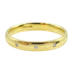 18ct gold ring with three small round brilliant cut diamonds, hallmarked