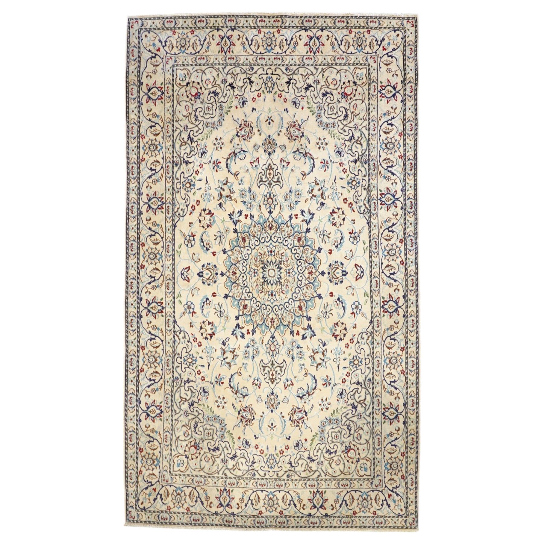 Central Persian Nain hand-knotted silk and wool rug, ivory field with a cusped medallion  issuing radiating pendants, with an all-over design of scrolling arabesques, palmettes and floral sprays, framed main border of meandering vinery and stylized palmettes, flanked by narrow guard stripes, cotton fringe ends  