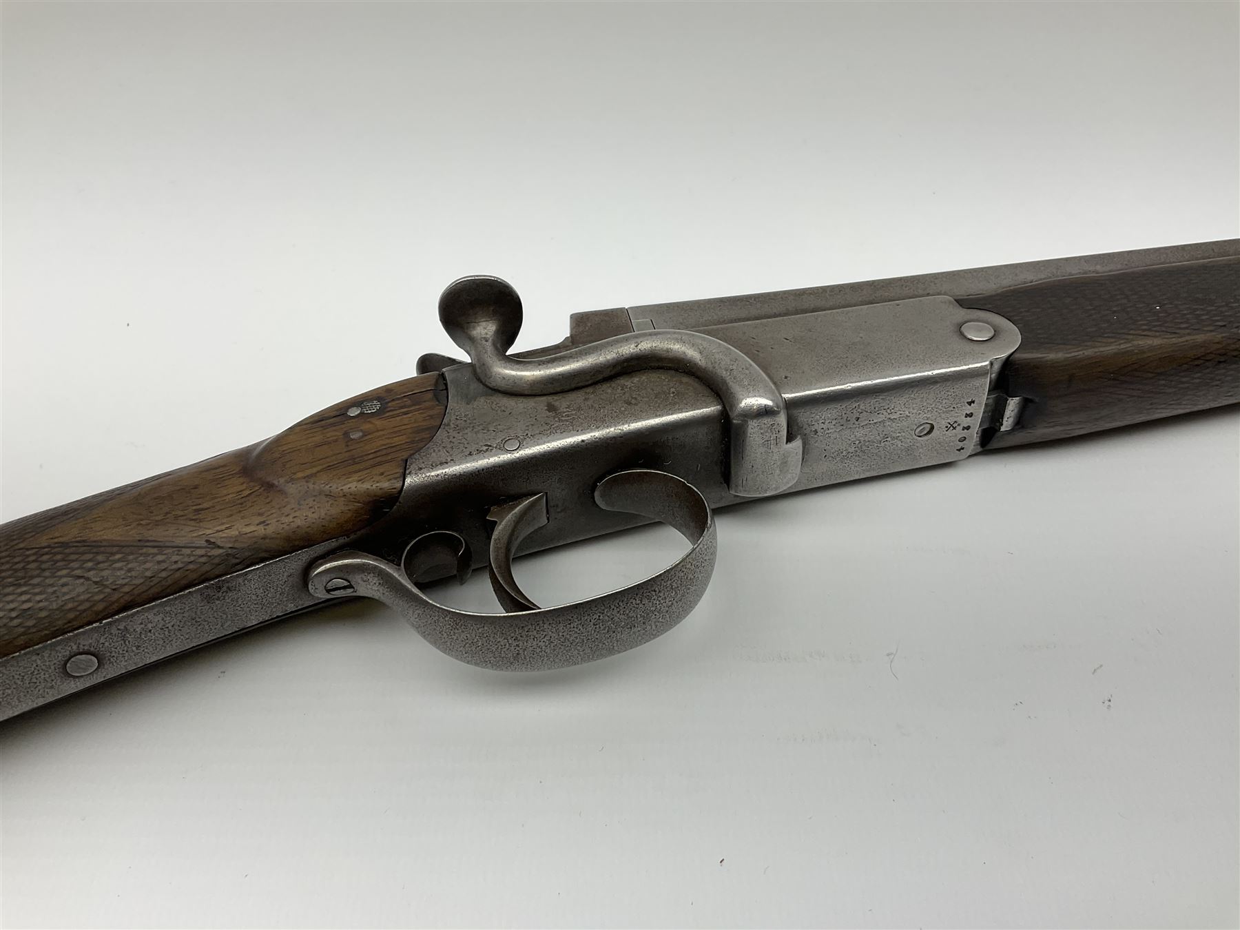 W. Horton 98 Buchanan Street Glasgow 20-bore single barrel centre hammer sporting gun, 71cm octagonal to round barrel with side lever opening, walnut stock with chequered grip and fore-end and steel butt plate, serial no.40334, L110cm SHOTGUN CERTIFICATE REQUIRED