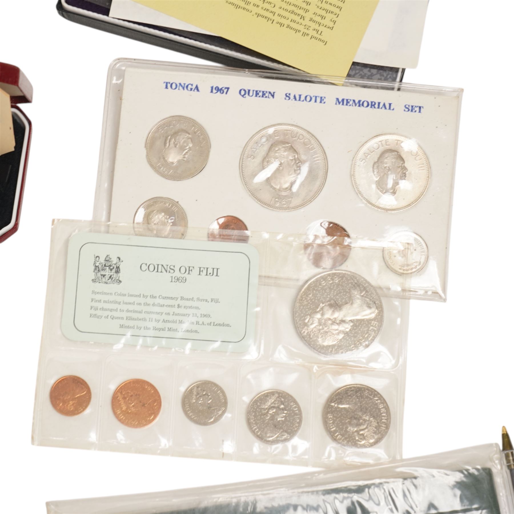 Twelve international proof coin sets, all produced by The Franklin Mint and containing high denomination silver coins, comprising two Republic of the Philippines 1975 proof eight coin sets, two Commonwealth of the Bahamas proof nine coin sets, 1973 and 1976, Guyana 1976 proof eight coin set, Jamaica 1976 proof nine coin set, Papua New Guinea 1976 proof eight coin set, First National Coinage of Barbados 1973 proof eight coin set, Ethiopia 1977 proof five coin set, Republic of Seychelles 1976 proof eight coin set, British Virgin Islands 1977 Royal Silver Jubilee proof six coin set, First Official Coinage of the British Virgin Islands 1973 proof six coin set; together with Pobjoy Mint Isle of Man 1977 silver proof seven coin set, 'Commemoration of the 1100th Anniversary of the Settlement of Iceland' 1974 proof two coin set, The Royal Mint United Kingdom 1977 Silver Jubilee silver proof crown coin, and other international proof sets