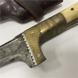 Afghan Khyber knife (Choora), blade engraved along the top edge with ornate brass and bone grip, with leather scabbard, overall L31cm, blade L20cm