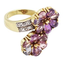 9ct gold sapphire and diamond flower head crossover ring, two flowers each set with pear cut, multi-coloured sapphires, to split diamond set shoulders, Birmingham 2006, total sapphire weight approx 3.30 carat
