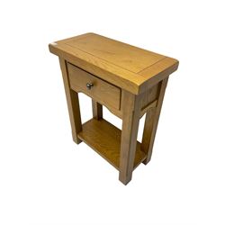Solid light oak side table, fitted with single drawer, raised on square chamfered supports united by under tier