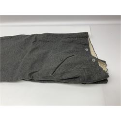 Pair of WW2 German Other Ranks trousers c1940-42, stamped C.& A. Brenninkmeyer Workstatten; WW2 German Army webbing belt with steel 'Gott Mit Uns' buckle; and WW2 German leather belt with 'Stahlhelm' (Steel Helmet League) members buckle (3)