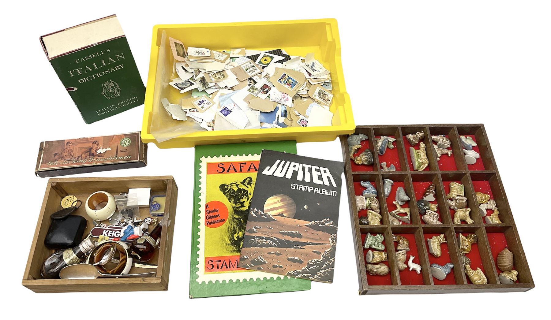 Collection of whimsy figures in a wooden display case, together with other assorted collectables, including stamps, pin badges etc