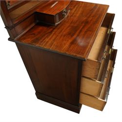 Edwardian mahogany herring-bone inlaid dressing chest, with swivel bevelled dressing mirror, supports with finials, and trinket drawer above chest with three graduated drawers on bracket feet