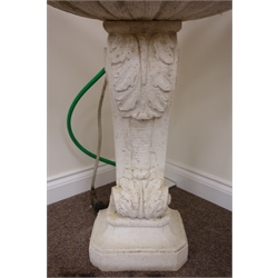  Painted composite stone fountain, comprising of small boy holding urn above shell basin on classical style column. W80cm, H160cm, D63cm  
