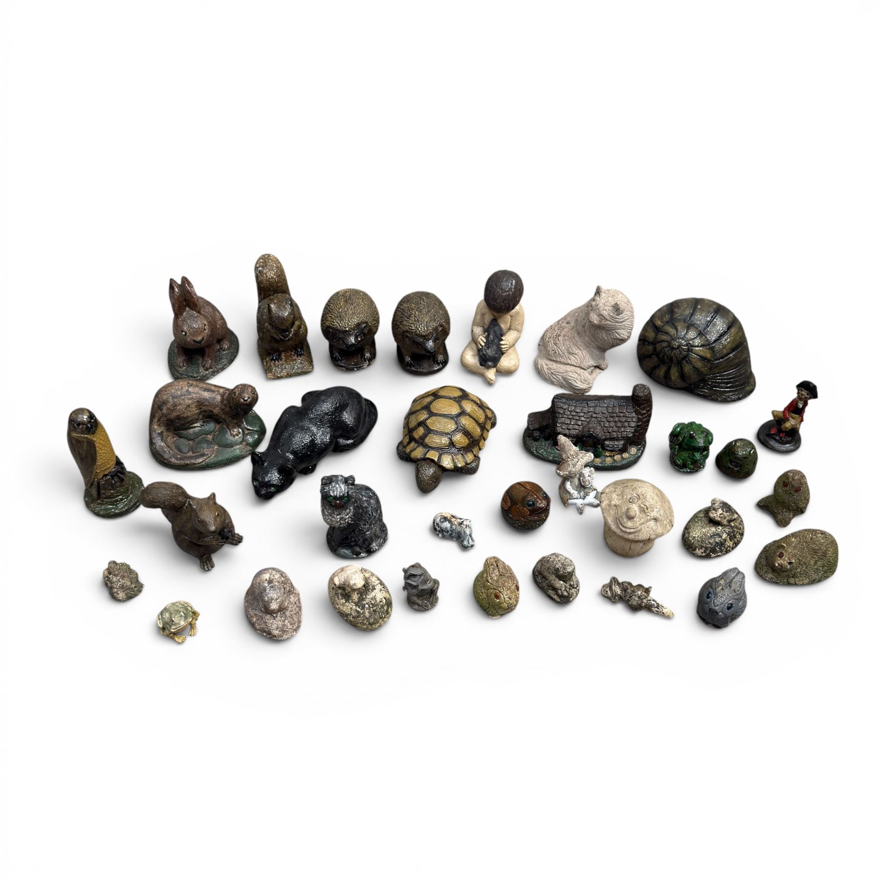 Collection of 33 small glazed cast stone garden animals and figures