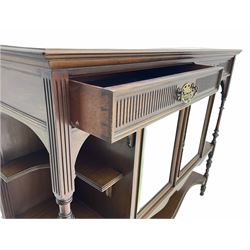Late Victorian walnut sideboard, rectangular moulded top over two drawers, double cupboard enclosed by two bevel glazed doors, turned supports